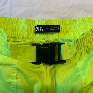 Neon jogger pants with buckle
